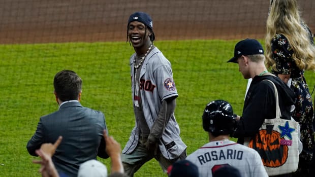 Travis Scott on the field before game six of the 2021 World Series.
